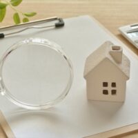 Magnifying Glass and Small Toy house